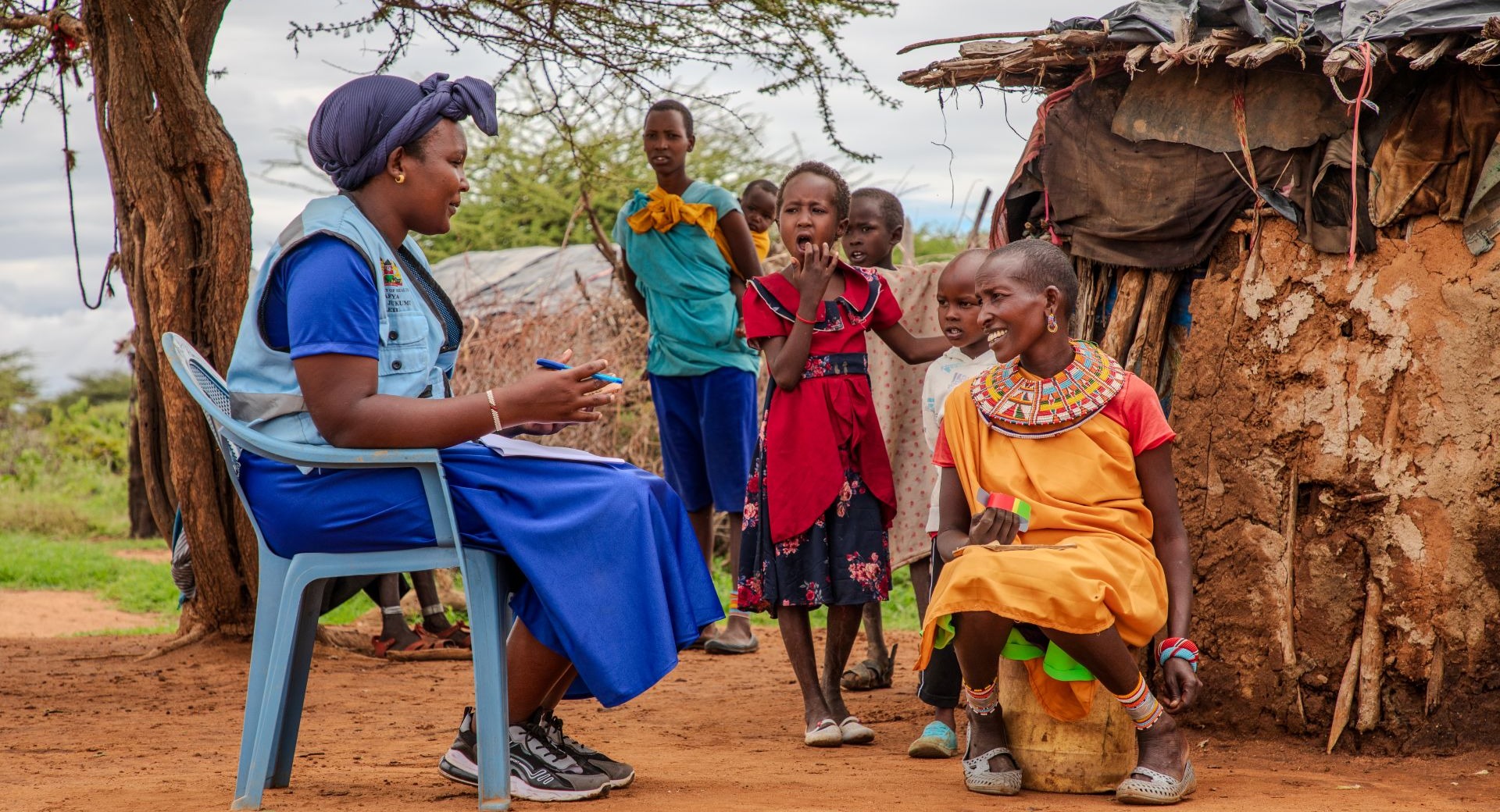 An Action Against Hunger community health worker visiting a family in remote Kenya