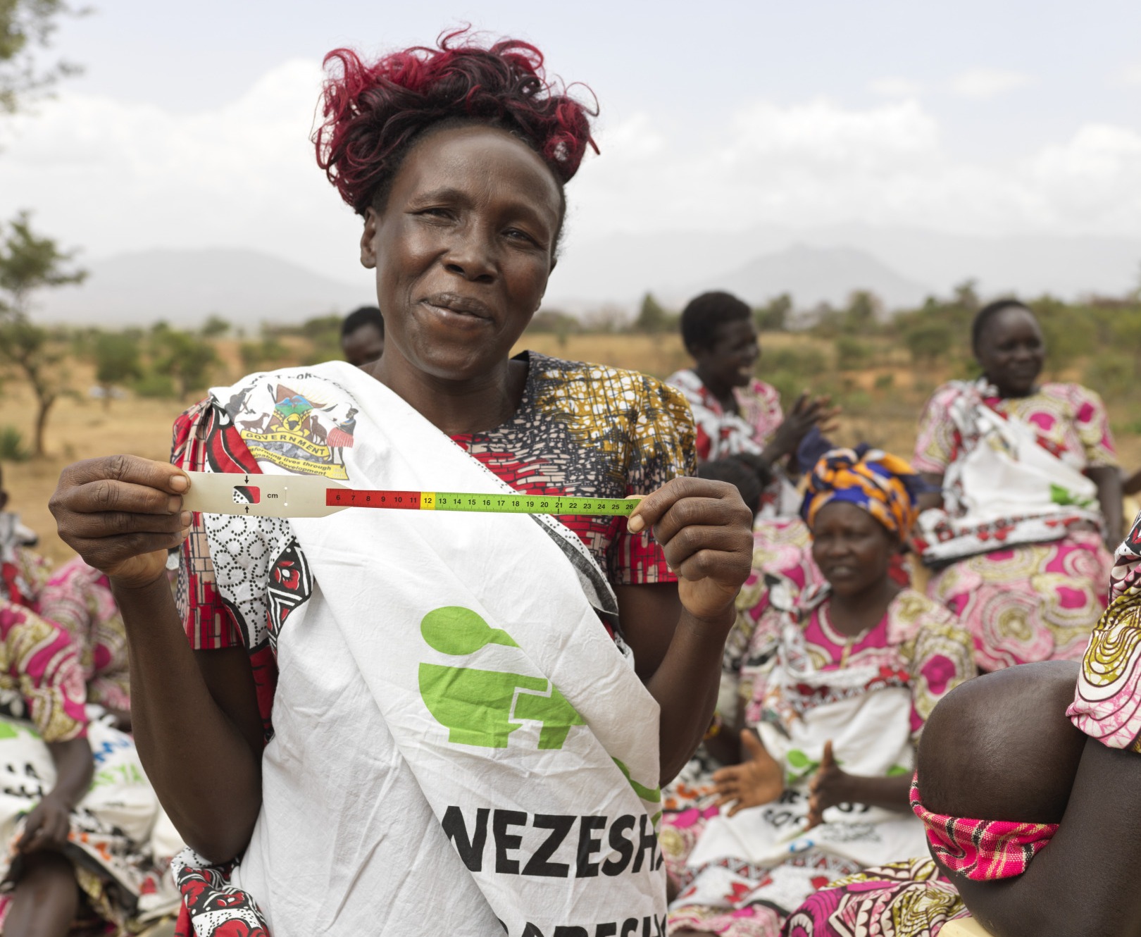 Rose shows the MUAC band, a tool to help mothers detect malnutrition at home.