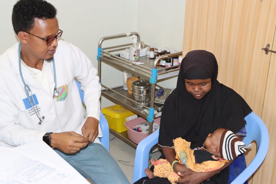 Abay and her daughter during a consultation with a doctor in the first week of treatment.