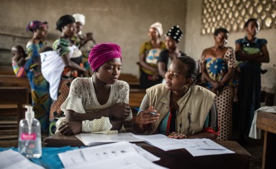 A psycho-social worker meets with women in Kichanga, DRC.