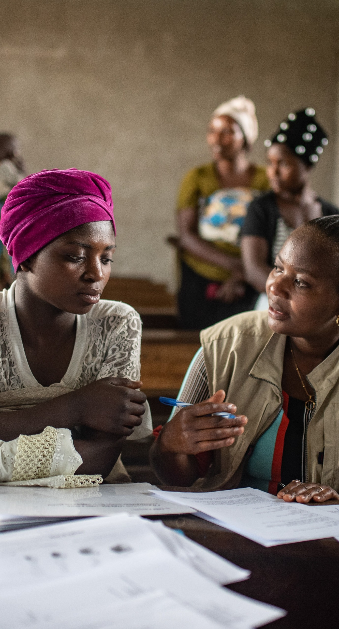 A psycho-social worker meets with women in Kichanga, DRC.