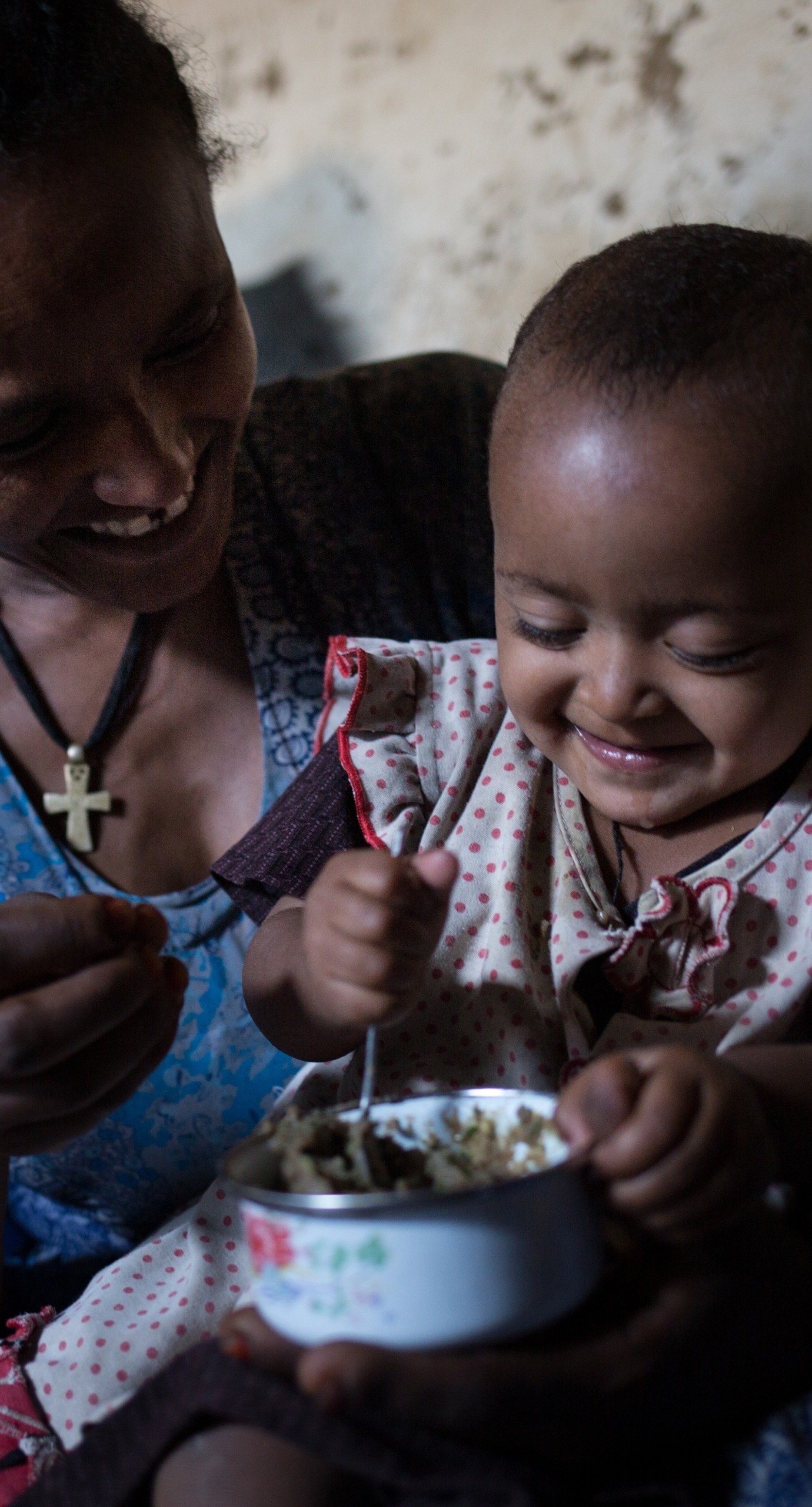 Shewagu with her two-year-old daughter.