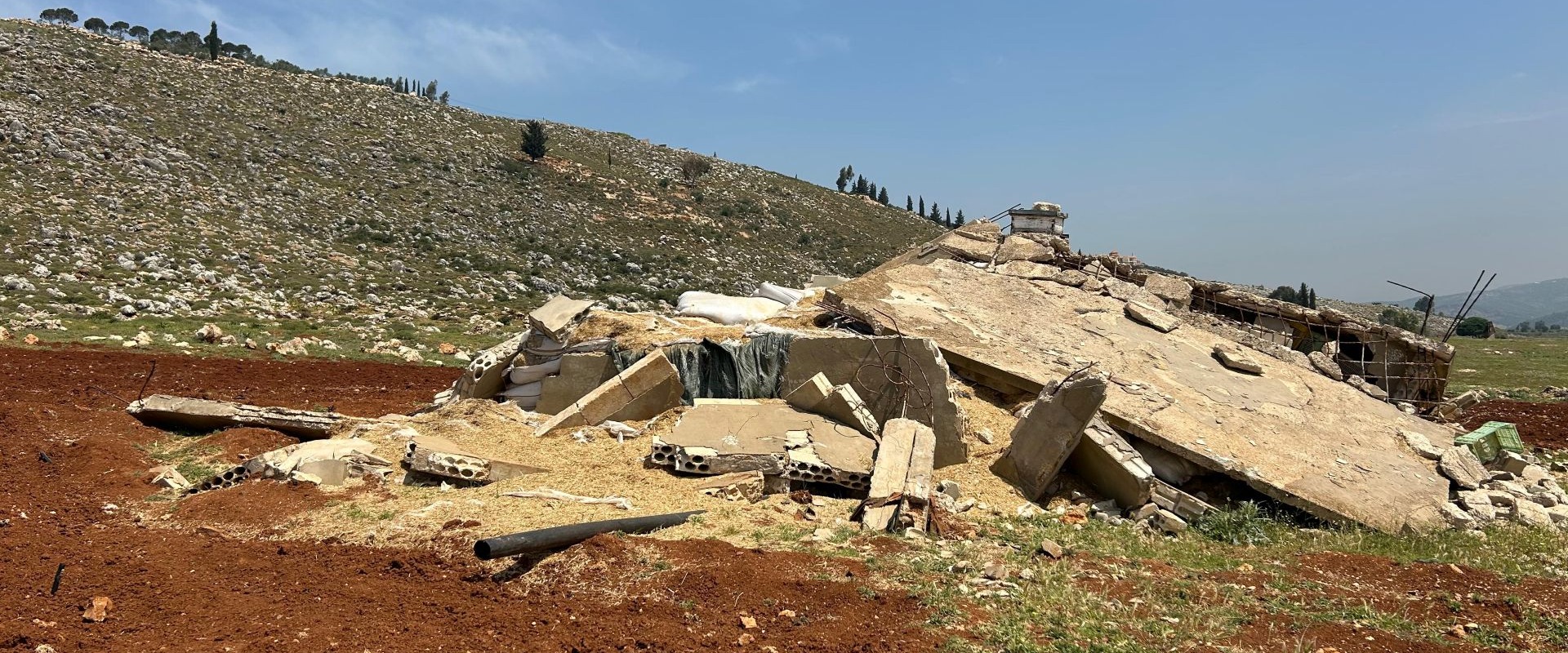 Destroyed farm infrastructure in Lebanon.
