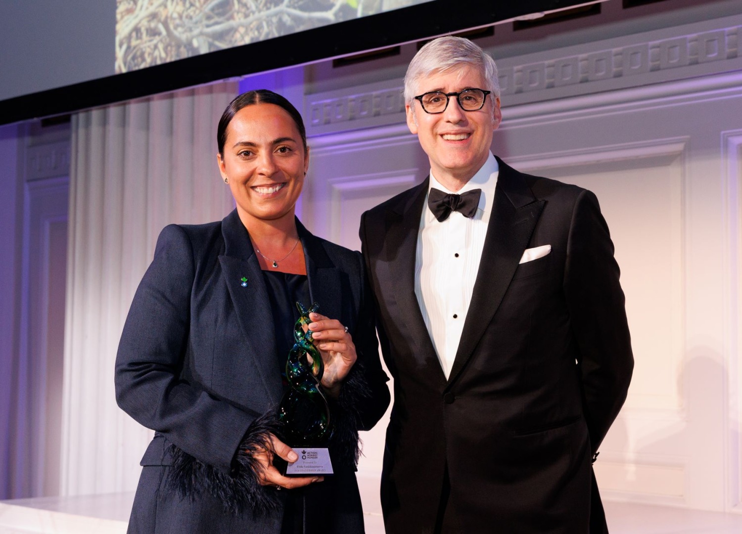 Farida “Frida” Gadzhimirzaeva and Mo Rocca at Action Against Hunger's 2024 gala