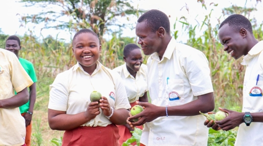 Patience and her fellow club members grow produce in the school garden.